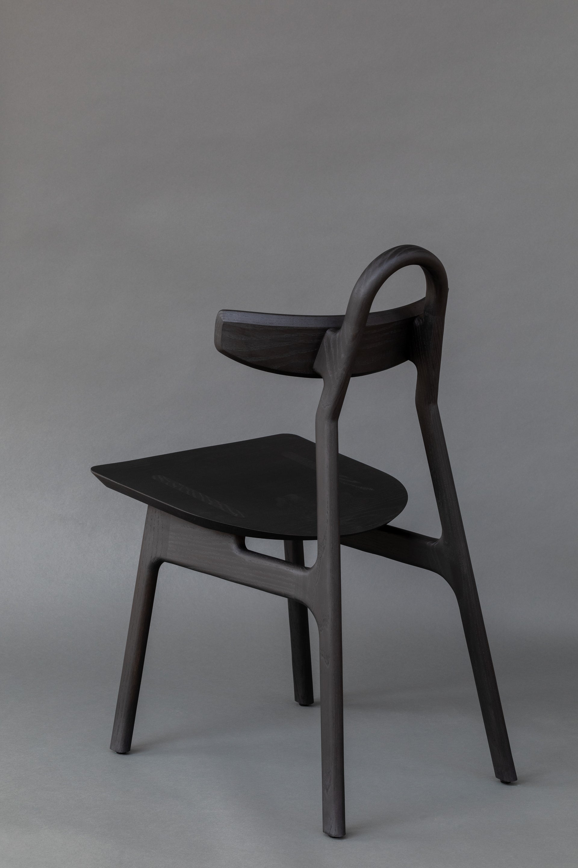 The Moto Chair, Designer Furniture, Black Ash Back Side Angle